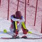 Mikaela Shiffrin, of the United States sits on the side of the course after skiing out in the first run of the women&#39;s slalom at the 2022 Winter Olympics, Wednesday, Feb. 9, 2022, in the Yanqing district of Beijing. (AP Photo/Robert F. Bukaty)