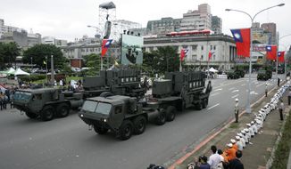 Taiwan&#39;s U.S.-made Patriot surface-to-air missile batteries pass during the Republic of China National Day parade in Taipei, Taiwan on Oct. 10, 2007. The Biden administration has approved a $100 million support contract with Taiwan aimed at boosting the island’s missile defense systems as it faces increasing pressure from China. (AP Photo/Wally Santana, File)  **FILE**