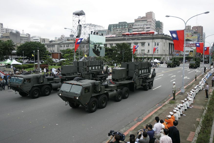 Taiwan&#39;s U.S.-made Patriot surface-to-air missile batteries pass during the Republic of China National Day parade in Taipei, Taiwan on Oct. 10, 2007. The Biden administration has approved a $100 million support contract with Taiwan aimed at boosting the island’s missile defense systems as it faces increasing pressure from China. (AP Photo/Wally Santana, File)  **FILE**