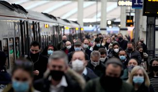 Masks have been required in public, even for those who keep up with COVID-19 vaccinations. Effective prevention and treatment methods have eluded experts, who lose public trust with every policy reversal and failure to control the pandemic. (Associated Press)