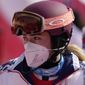 Mikaela Shiffrin, of the United States leaves the finish area after she skied out in the first run of the women&#39;s slalom at the 2022 Winter Olympics, Wednesday, Feb. 9, 2022, in the Yanqing district of Beijing. (AP Photo/Luca Bruno)