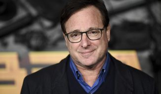 Bob Saget arrives at a screening of &quot;MacGruber&quot; on Dec. 8, 2021, in Los Angeles. Saget&#39;s family has released a statement on the cause of his death last month in Florida, citing authorities saying the actor-comedian died from an accidental blow to the head. (Photo by Richard Shotwell/Invision/AP, File)