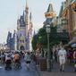 Guests stroll along Main Street at the Magic Kingdom theme park at Walt Disney World on Aug. 30, 2021, in Lake Buena Vista, Fla. A theme-park comeback continued to boost Disney&#x27;s results in the most recent quarter. The company also added more subscribers to its Disney+ streaming service than analysts expected. (AP Photo/John Raoux, File)