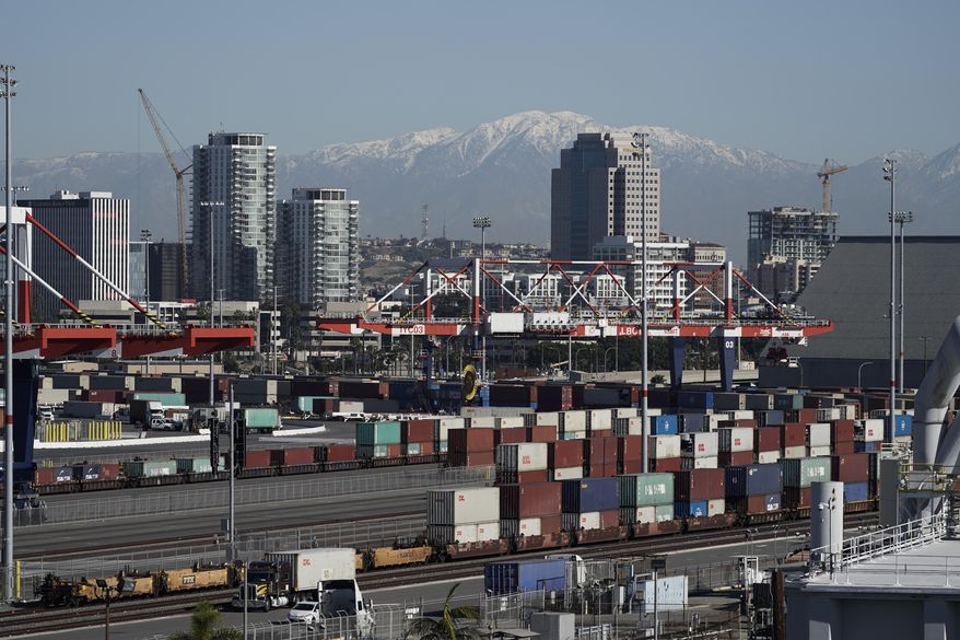 Shipping containers are stacked high at the Port of Long Beach in Long Beach, Calif., on Tuesday, Jan. 11, 2022. Southern California's Port of Long Beach is still dealing with a backlog of waiting cargo vessels, and its top official has renewed a call for transforming the supply chain into a 24-hour, seven-days-a-week operation. (AP Photo/Jae C. Hong, File)