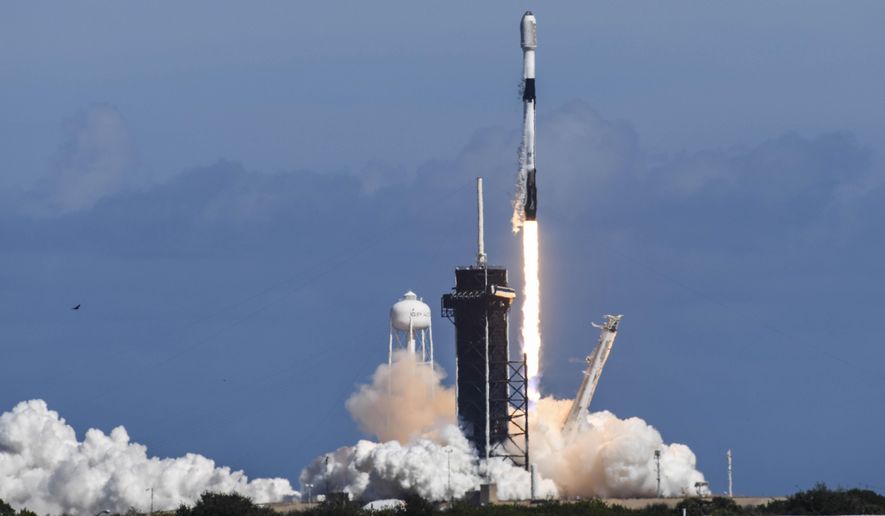 A SpaceX Falcon 9 rocket lifts off from Pad 39A at Kennedy Space Center, Fla.,Thursday, Feb. 3, 2022. The rocket is carrying a batch of Starlink satellites. Spacex&#x27;s newest fleet of Starlink satellites are tumbling out of orbit because of a geomagnetic storm. In an online update Tuesday, Feb. 8, Elon Musk&#x27;s company reported that up to 40 of the 49 small Internet-service satellites launched last Thursday have either re-entered the atmosphere and burned up, or are on the verge of doing so. (Craig Bailey/Florida Today via AP)