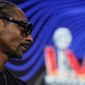 Snoop Dogg answers a question during a news conference for the Super Bowl LVI halftime show Thursday, Feb. 10, 2022, in Los Angeles. (AP Photo/Morry Gash)