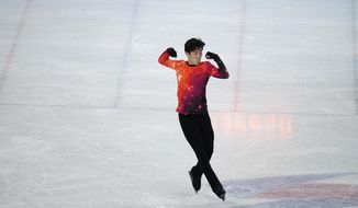 Nathan Chen, of the United States, competes in the men&#39;s free skate program during the figure skating event at the 2022 Winter Olympics, Thursday, Feb. 10, 2022, in Beijing. (AP Photo/Jae C. Hong)