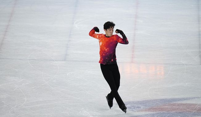 Nathan Chen, of the United States, competes in the men&#x27;s free skate program during the figure skating event at the 2022 Winter Olympics, Thursday, Feb. 10, 2022, in Beijing. (AP Photo/Jae C. Hong)