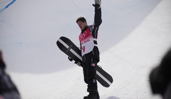 United States&#x27; Shaun White waves in the halfpipe course after the men&#x27;s halfpipe finals at the 2022 Winter Olympics, Friday, Feb. 11, 2022, in Zhangjiakou, China. (AP Photo/Francisco Seco)