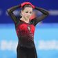 Kamila Valieva, 15, of the Russian Olympic Committee, reacts after the women&#39;s team free skate program during the figure skating competition at the 2022 Winter Olympics, Monday, Feb. 7, 2022, in Beijing. The 2022 Games&#39; first major scandal has managed to involve the 15-year-old figure skater who has tested positive for using a banned heart medication that may cost her Russia-but-not-really-Russia team a gold medal in team competition. Kamila Valieva continues to train even as her final disposition is considered, and she may yet compete in the women&#39;s individual competition, in which she is favored. (AP Photo/Natacha Pisarenko)