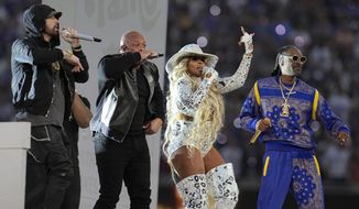 Eminem, from left, performs with Dr. Dre, Mary J. Blige and Snoop Dogg during halftime of the NFL Super Bowl 56 football game between the Los Angeles Rams and the Cincinnati Bengals Sunday, Feb. 13, 2022, in Inglewood, Calif. (AP Photo/Marcio Jose Sanchez)