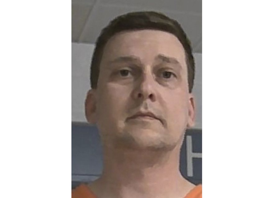 This booking photo released Oct. 9, 2021, by the West Virginia Regional Jail and Correctional Facility Authority shows Jonathan Toebbe. Toebbe has pleaded guilty to trying to pass information about American nuclear-powered warships to a foreign country. Toebbe pleaded guilty in federal court in Martinsburg, W.Va., to a single count of conspiracy to communicate restricted data. (West Virginia Regional Jail and Correctional Facility Authority via AP)