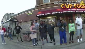 FILE - In this image from a police body camera, bystanders, including Alyssa Funari, filming at left; Charles McMillan, center left in light colored shorts; Christopher Martin, center in gray, with hand on head; Donald Williams, center in shorts; Genevieve Hansen, filming, fourth from right; Darnella Frazier, filming, third from right, witness as then Minneapolis police officer Derek Chauvin pressed his knee on George Floyd&#39;s neck for several minutes, killing Floyd on May 25, 2020, in Minneapolis. Frazier, who recorded the widely seen video of Floyd’s killing, began crying Monday, Feb. 14, as she started testifying in the federal trial of three former Minneapolis police officers who are charged with violating the Black man’s civil rights, prompting the judge to take a quick, unexpected break. (Minneapolis Police Department via AP, File)