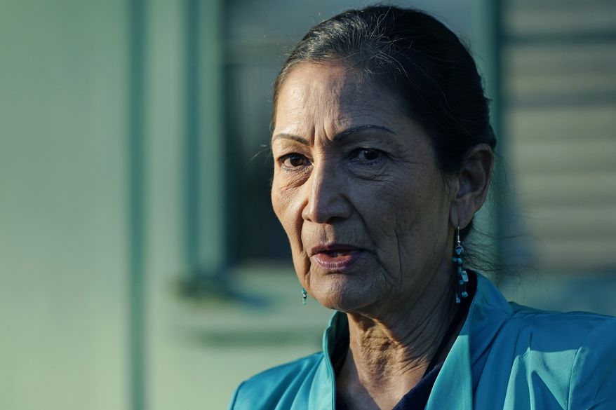 Secretary of the Interior Deb Haaland speaks with reporters about visiting several communities and sites in Mississippi to honor individuals and events that advanced the Civil Rights Movement, while standing outside the Medgar and Myrlie Evers Home National Monument in Jackson, Miss., Tuesday, Feb. 15, 2022. (AP Photo/Rogelio V. Solis)