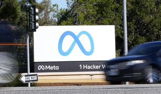 Facebook unveiled their new Meta sign at the company headquarters in Menlo Park, Calif., on Oct. 28, 2021. Facebook parent Meta Platforms Inc. has settled a decade-old class-action lawsuit, Tuesday, Feb. 15, 2022,  over the company’s use of “cookies” in 2010 and 2011 that tracked people online even after they logged off the Facebook platform. As part of the proposed settlement, which must still be approved by a judge, Meta has agreed to delete all the data it wrongfully collected during the period. (AP Photo/Tony Avelar) **FILE**