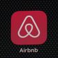 The Airbnb app icon is displayed on an iPad screen in Washington, D.C., on May 8, 2021. Airbnb has reported its second-straight quarterly profit and it says its revenue is now higher than it was before the pandemic. Airbnb said Tuesday, Feb. 15, 2022 that it earned $55 million in the fourth quarter. (AP Photo/Patrick Semansky, File)