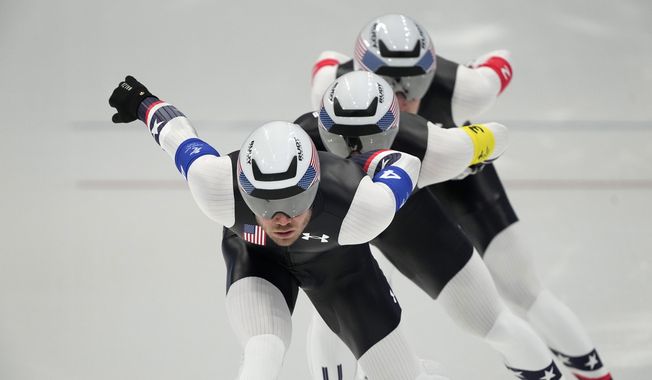 Team United States, led by Joey Mantia, with Emery Lehman center and Casey Dawson, competes during the speedskating men&#x27;s team pursuit finals at the 2022 Winter Olympics, Tuesday, Feb. 15, 2022, in Beijing. (AP Photo/Ashley Landis)