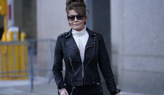 Former Alaska Gov. Sarah Palin leaves a courthouse in New York, Monday, Feb. 14, 2022. A judge said Monday he’ll dismiss a libel lawsuit that Palin filed against The New York Times, claiming the newspaper damaged her reputation with an editorial falsely linking her campaign rhetoric to a mass shooting. U.S. District Judge Jed Rakoff made the ruling with a jury still deliberating at the trial where the former Alaska governor and vice-presidential candidate testified last week. (AP Photo/Seth Wenig)