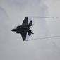 A United States Marine Corps F-35B Lightning II takes part in an aerial display during the Singapore Airshow 2022 at Changi Exhibition Centre in Singapore, Tuesday, Feb. 15, 2022. (AP Photo/Suhaimi Abdullah) ** FILE **