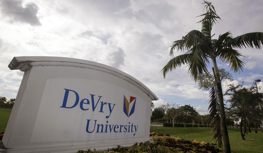 This Nov. 24, 2009, photo, shows the entrance to the DeVry University in Miramar, Fla. The Biden administration says it will cancel more than $70 million in student debt for borrowers who say they were defrauded by the for-profit DeVry University. It marks the first time the Education Department has approved such claims for an institution that&#x27;s still in operation. (AP Photo/J Pat Carter, File)