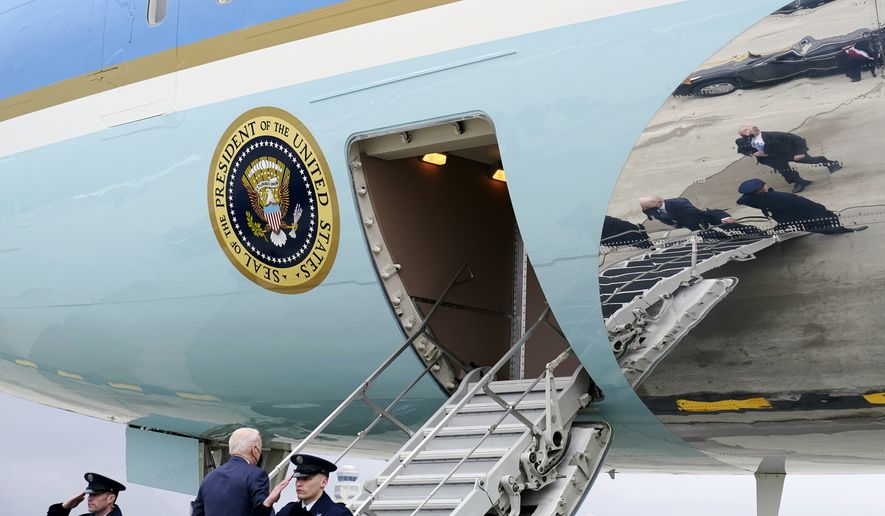 In this file photo, President Joe Biden boards Air Force One upon departure from Cleveland Hopkins International Airport, Thursday, Feb. 17, 2022, in Cleveland. (AP Photo/Alex Brandon)