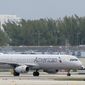 An American Airlines Airbus A321-231 taxies to the gate, Tuesday, Oct. 20, 2020, at Fort Lauderdale-Hollywood International Airport in Fort Lauderdale, Fla. (AP Photo/Wilfredo Lee, File)