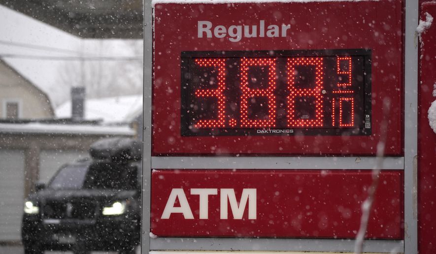 The price-per-gallon sign is illuminated at a gasoline station, Feb. 11, 2022, in Denver, Colorado, USA. Saudi Arabia is signaling it isn’t willing to pump more oil and won’t push for changes to an agreement forged with Russia and other producers that has kept a lid on oil production levels. This has Washington concerned as gasoline prices rise at the pump and tensions over Ukraine fuel market uncertainty. (AP Photo/David Zalubowski, File)