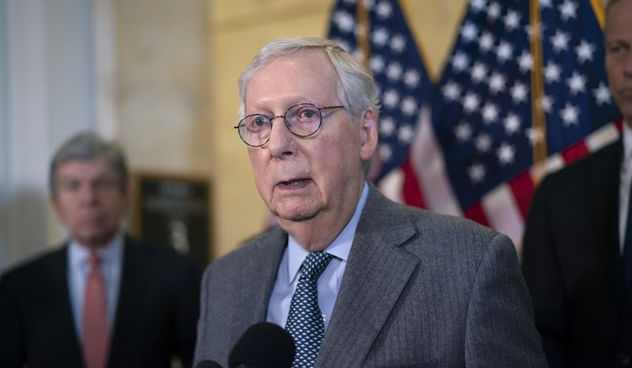 Senate Minority Leader Mitch McConnell, R-Ky., speaks to reporters after a Republican strategy meeting at the Capitol in Washington, Tuesday, Feb. 15, 2022. (AP Photo/J. Scott Applewhite) ** FILE **