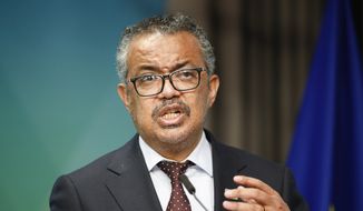 World Health Organization Director-General Tedros Adhanom Ghebreyesus speaks during a media conference at an EU Africa summit in Brussels, Friday, Feb. 18, 2022. European Union leaders on Thursday lauded the bloc&#39;s vaccine cooperation with Africa in the fight against the coronavirus, but there was no sign they would move toward a temporary lifting of intellectual property rights protection for COVID-19 shots. (Johanna Geron, Pool Photo via AP)