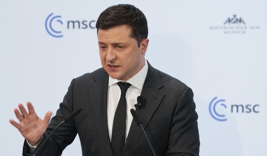 Ukrainian President Volodymyr Zelenskyy delivers his speech during the Munich Security Conference in Munich, Germany, Saturday, Feb. 19, 2022. (AP Photo/Michael Probst)