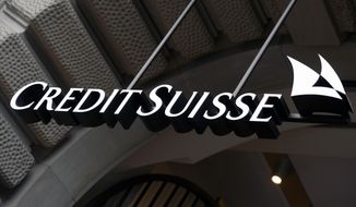 The logo of the Swiss bank Credit Suisse is seen on a building in Zurich, Switzerland, Oct. 21, 2015. A German newspaper and other media say a leak of data from Credit Suisse, Switzerland’s second-biggest bank, reveals details of the accounts of more than 30,000 clients — some of them unsavory — and points to possible failures of due diligence in checks on many customers. Credit Suisse said it “strongly rejects the allegations and insinuations about the bank’s purported business practices.” The German newspaper Sueddeutsche Zeitung said it received the data anonymously through a secure digital mailbox over a year ago. (Walter Bieri/Keystone via AP, File)