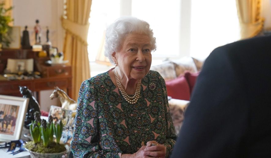 Queen Elizabeth II speaks during an audience at Windsor Castle where she met the incoming and outgoing Defence Service Secretaries, Wednesday, Feb. 16, 2022. (Steve Parsons, Pool via AP, File)