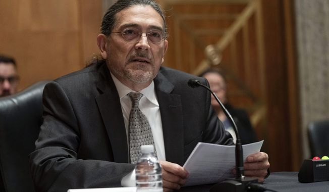 FILE - Census Bureau Director nominee Robert Santos, testifies before the Senate Homeland Security and Governmental Affairs committee, Thursday, July 15, 2021, on Capitol Hill in Washington.  Santos said Monday, Feb. 21, 2022,  that he has gone on a listening tour with stakeholders and the agency is making permanent community outreach efforts in an effort to restore any trust that was lost following attempts by the Trump administration to politicize the nation&#x27;s head count. (AP Photo/Jacquelyn Martin, File)