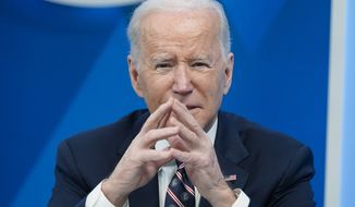 President Joe Biden speaks in the South Court Auditorium in the Eisenhower Executive Office Building on the White House complex, Tuesday, Feb. 22, 2022, in Washington. (AP Photo/Alex Brandon)