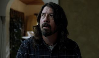 This image released by Open Road Films shows Dave Grohl in &quot;Studio 666.&quot; (Open Road Films via AP)