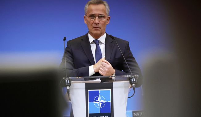 NATO Secretary-General Jens Stoltenberg prepares to address a media conference after a meeting of the NATO-Ukraine Commission at NATO headquarters in Brussels, Tuesday, Feb. 22, 2022. World leaders are getting over the shock of Russian President Vladimir Putin ordering his forces into separatist regions of Ukraine and they are focusing on producing as forceful a reaction as possible. Germany made the first big move Tuesday and took steps to halt the process of certifying the Nord Stream 2 gas pipeline from Russia. (AP Photo/Olivier Matthys)