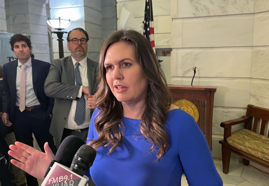 Former White House press secretary Sarah Sanders talks to reporters at the Arkansas state Capitol in Little Rock, Ark. on Feb. 22, 2022 after filing paperwork to run for governor. (AP Photo/Andrew DeMillo)