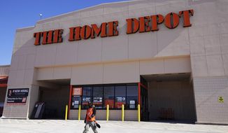 The Home Depot improvement store is seen in Niles, Ill., on Saturday, Feb. 19, 2022. Home Depot saw its sales remain strong in its fourth quarter as it continues to benefit from a sizzling housing market. Sales for the three months ended Jan. 30 rose to $35.72 billion from $32.26 billion. (AP Photo/Nam Y. Huh) **FILE**