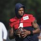 Texans quarterback Deshaun Watson (4) practices with the team during NFL football practice Monday, Aug. 2, 2021, in Houston. A judge has declined efforts by attorneys for Houston Texans quarterback Deshaun Watson to delay all his depositions in connection with lawsuits filed by 22 women who have accused him of sexual assault and harassment. During a court hearing Monday, Feb. 21, 2022, defense attorney Rusty Hardin asked that depositions be delayed until the end of a criminal investigation. (AP Photo/Justin Rex File)