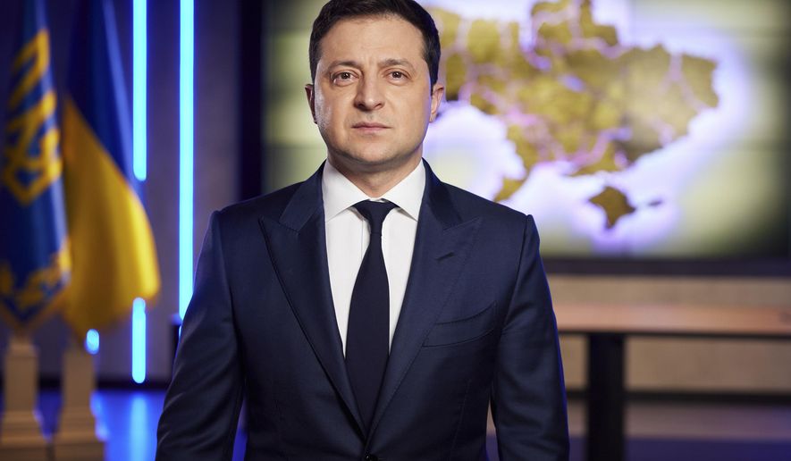In this photo provided by the Ukrainian Presidential Press Office, Ukrainian President Volodymyr Zelenskyy addresses the nation on a live TV broadcast in Kyiv, Ukraine, Tuesday, Feb. 22, 2022. President Zelenskyy has told the nation that Ukraine is &amp;quot;not afraid of anyone or anything.&amp;quot; He spoke during a chaotic day in which Russia appeared to be moving closer to an invasion, with President Vladimir Putin recognizing separatist regions of eastern Ukraine and then ordering forces there.(Ukrainian Presidential Press Office via AP)