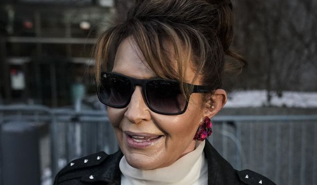 Former Alaska Gov. Sarah Palin leaves a courthouse in New York, Monday, Feb. 14, 2022. A Manhattan judge said Wednesday, Feb. 23, 2022 that lawyers for the former Alaska governor are seeking a new trial on her defamation claims against The New York Times, along with his removal from the case. (AP Photo/Seth Wenig, File)