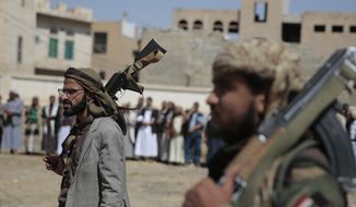Armed Houthi fighters attend the funeral procession of Houthi rebel fighters who were killed in recent fighting with forces of Yemen&#39;s internationally recognized government, in Sanaa, Yemen, on Nov. 24, 2021. (AP Photo/Hani Mohammed, File)