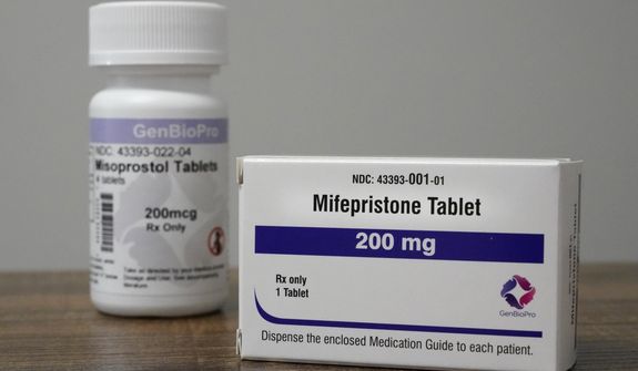 Containers of the medication used to end an early pregnancy sit on a table inside a Planned Parenthood clinic, Oct. 29, 2021, in Fairview Heights, Ill. A report released Thursday, Feb. 24, 2022 says most U.S. abortions are now done with pills rather than surgery. The trend spiked during the pandemic as telemedicine increased and pills by mail were allowed. (AP Photo/Jeff Roberson)