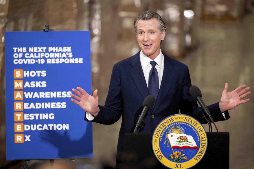 Gov. Gavin Newsom talks about California's COVID-19 response during a press conference in Fontana, Calif.,Feb. 17, 2022. On Friday, Feb. 25, 2022, Gov. Newsom announced he would lift 52 provisions from his pandemic executive orders. Since the start of the pandemic, Newsom has issued about 70 executive orders containing 561 provisions. Now, Newsom's office says just 30 will remain in effect. (Watchara Phomicinda/The Orange County Register via AP, File)