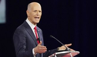 Sen. Rick Scott, R-Fla., speaks at the Conservative Political Action Conference (CPAC) Saturday, Feb. 26, 2022, in Orlando, Fla. (AP Photo/John Raoux)