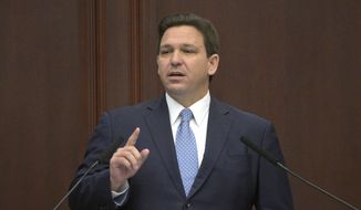 Florida Gov. Ron DeSantis addresses a joint session of a legislative session, Jan. 11, 2022, in Tallahassee, Fla. (AP Photo/Phelan M. Ebenhack, File)
