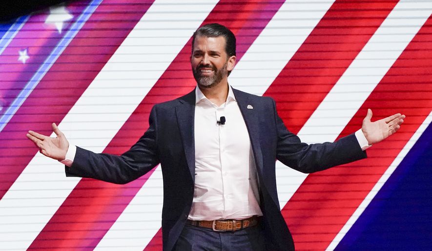 Donald Trump Jr. smiles at the audience before speaking at the Conservative Political Action Conference (CPAC) Sunday, Feb. 27, 2022, in Orlando, Fla. (AP Photo/John Raoux) ** FILE **