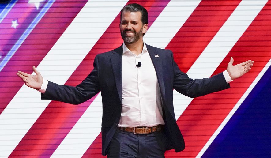 Donald Trump Jr. smiles at the audience before speaking at the Conservative Political Action Conference (CPAC) Sunday, Feb. 27, 2022, in Orlando, Fla. (AP Photo/John Raoux) ** FILE **