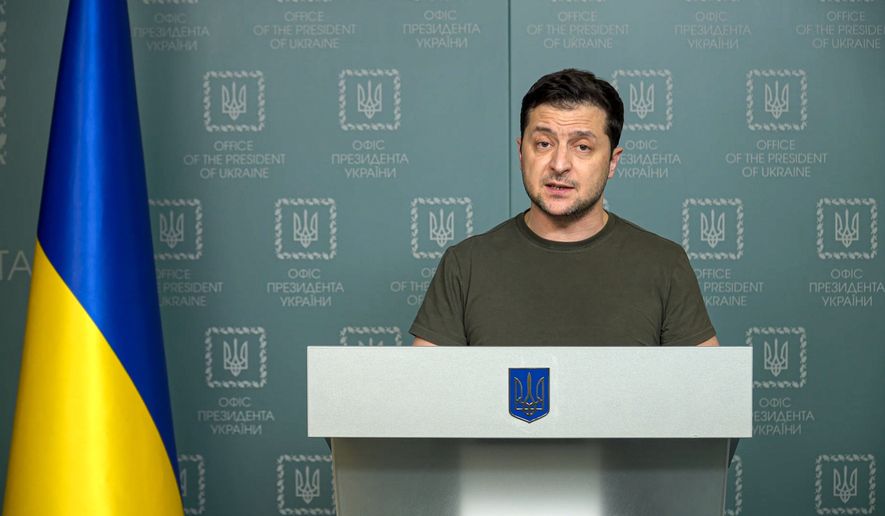 In this photo taken from video provided by the Ukrainian Presidential Press Office, Ukrainian President Volodymyr Zelenskyy speaks to the nation in Kyiv, Ukraine, Sunday, Feb. 27, 2022. Street fighting broke out in Ukraine's second-largest city Sunday and Russian troops put increasing pressure on strategic ports in the country's south following a wave of attacks on airfields and fuel facilities elsewhere that appeared to mark a new phase of Russia's invasion. (Ukrainian Presidential Press Office via AP)