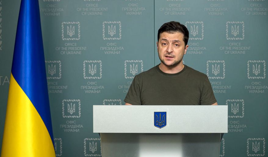 In this photo taken from video provided by the Ukrainian Presidential Press Office, Ukrainian President Volodymyr Zelenskyy speaks to the nation in Kyiv, Ukraine, Sunday, Feb. 27, 2022. Street fighting broke out in Ukraine's second-largest city Sunday and Russian troops put increasing pressure on strategic ports in the country's south following a wave of attacks on airfields and fuel facilities elsewhere that appeared to mark a new phase of Russia's invasion. (Ukrainian Presidential Press Office via AP)